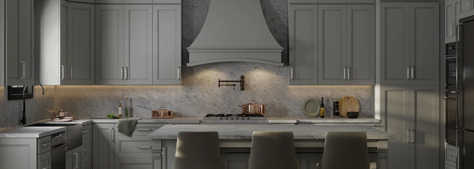 Modern kitchen with gray cabinets, marble countertops and backsplash, a central island with stools, under-cabinet lighting, and stainless steel appliances.